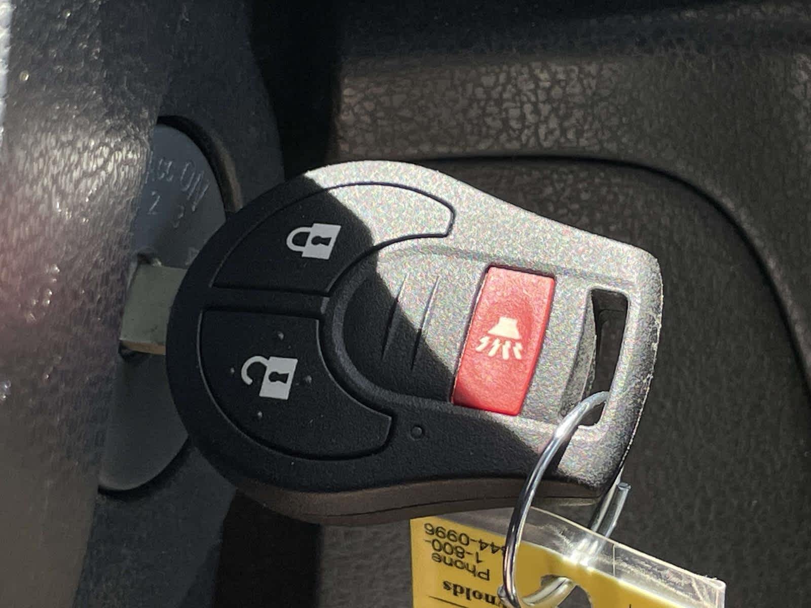 Used 2014 Metallic Peacock Nissan SV image 4