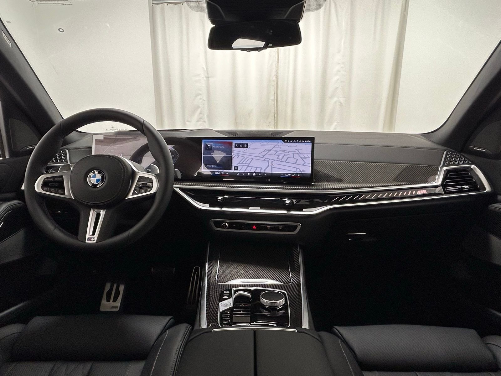 New 2026 Black Sapphire Metallic BMW M60i image 8