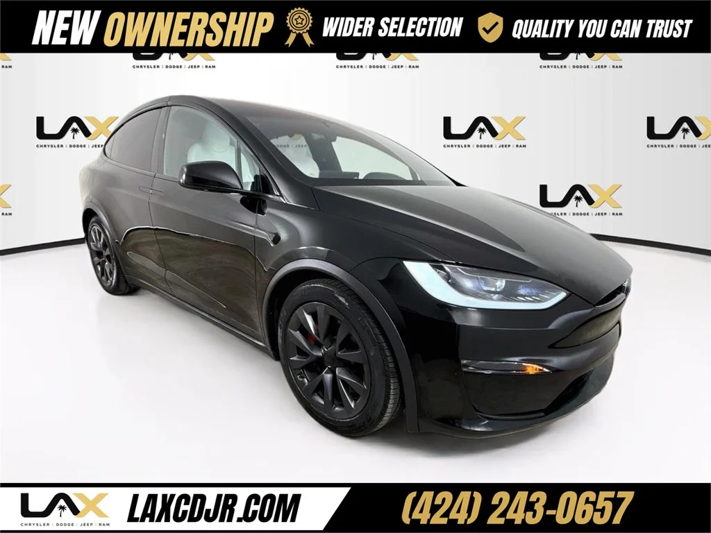 Used 2024 Black Tesla Plaid image 1