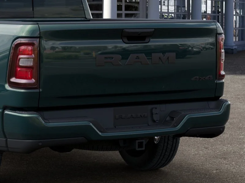 New 2026 Serrano Green Metallic RAM Express Quad Cab 4x4 6