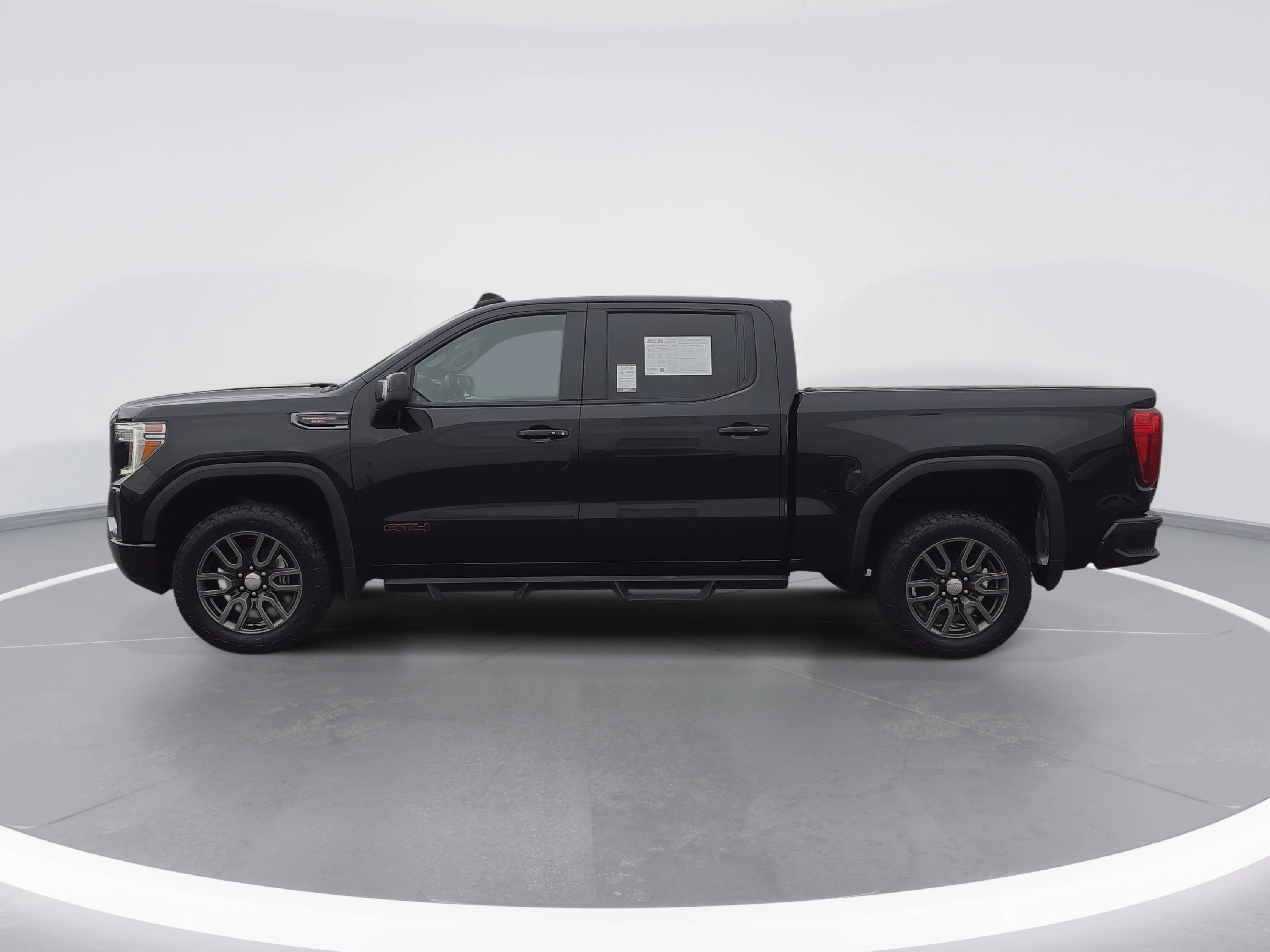 Used 2021 EBONY TWILIGHT METALLIC GMC AT4 image 6