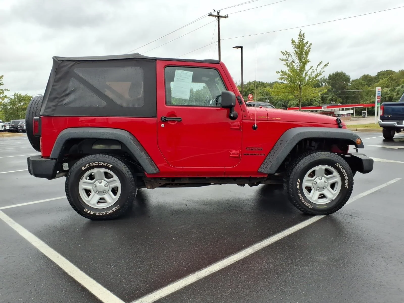 Used 2013 Flame Red Clearcoat Jeep Sport image 9