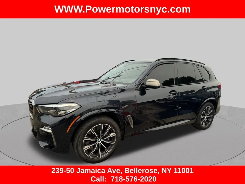 Used 2020 Black BMW M50i image 1