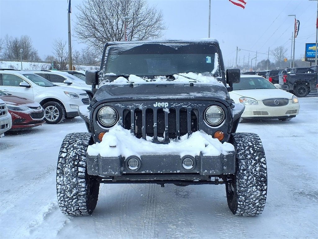 Used 2013 Jeep Wrangler Unlimited Sport with VIN 1C4BJWDG6DL704708 for sale in Howell, MI