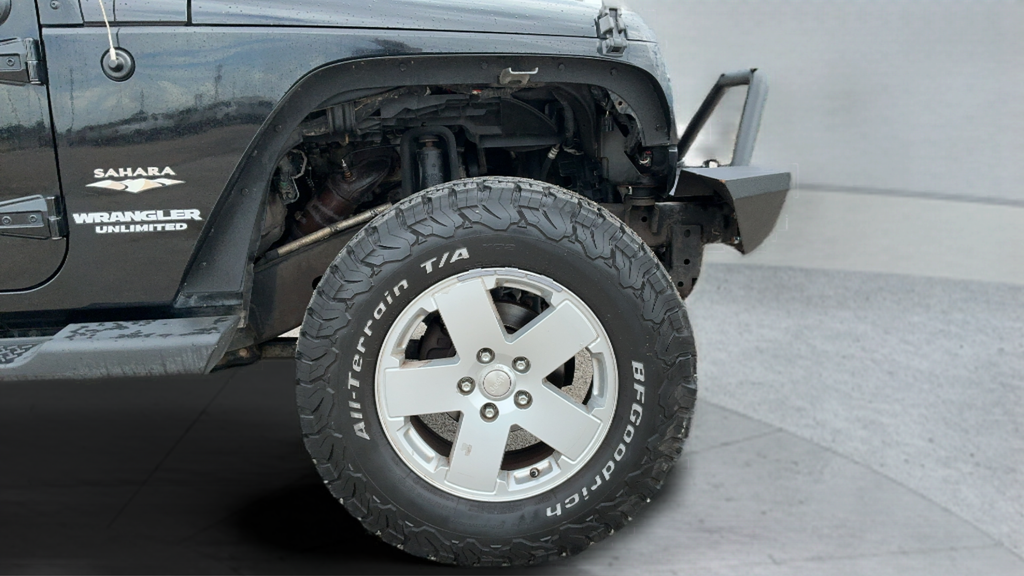 Used 2012 Black Clearcoat Jeep Unlimited Sahara image 23