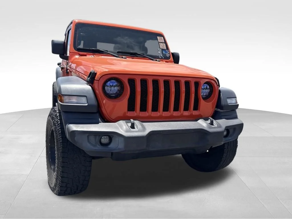 Used 2019 Orange Jeep Unlimited Sport image 4