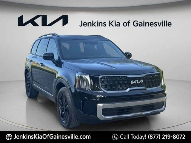 Used 2023 Black Kia EX X-Line image 1