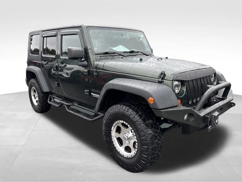 Used 2010  Jeep Unlimited Sport image 8