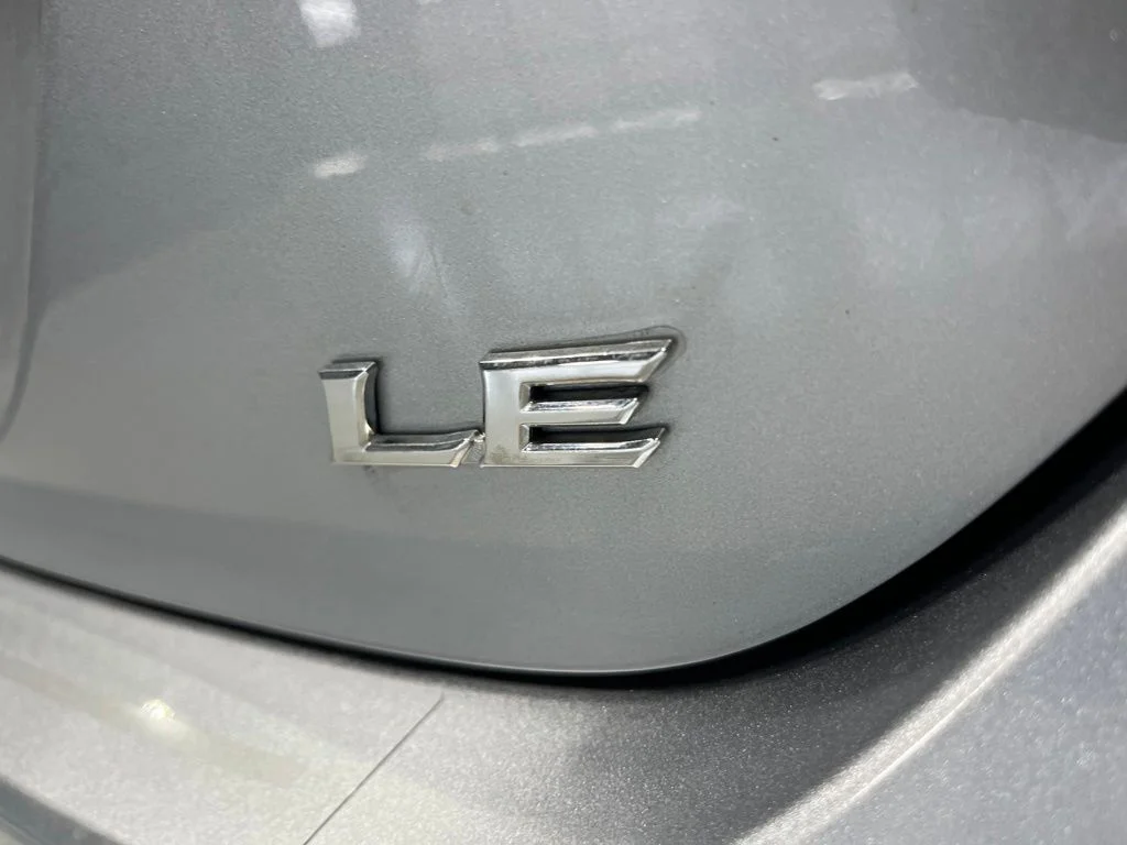 Used 2023 Celestial Silver Metallic Toyota LE image 33