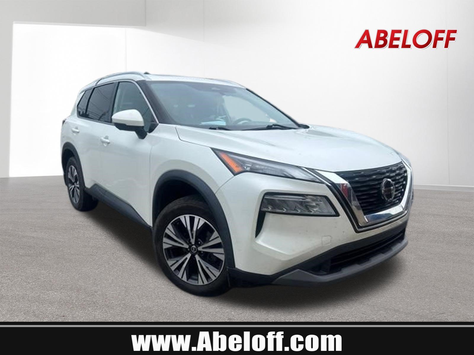 Used 2021 Pearl White Tricoat Nissan SV image 1
