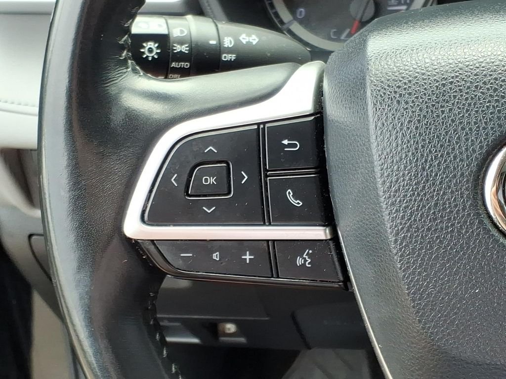 Used 2022 Midnight Black Metallic Toyota LE image 19