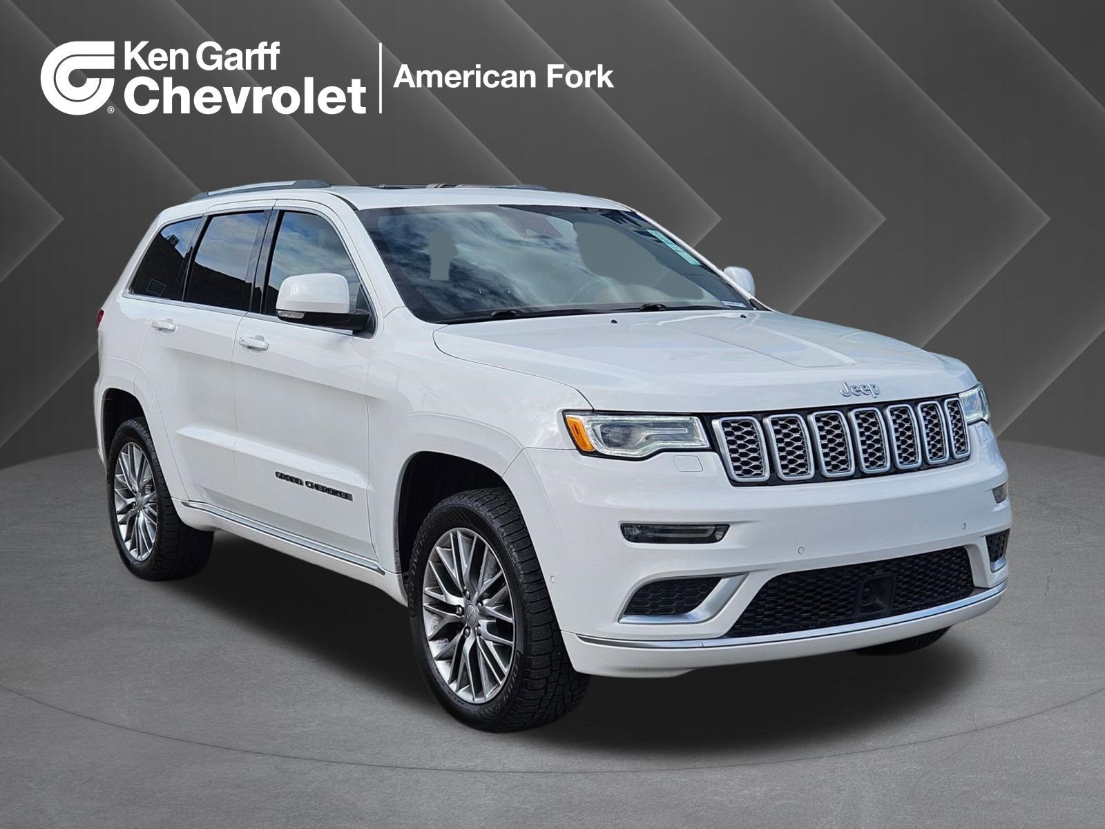 Used 2018 Ivory 3-Coat Jeep Summit image 1