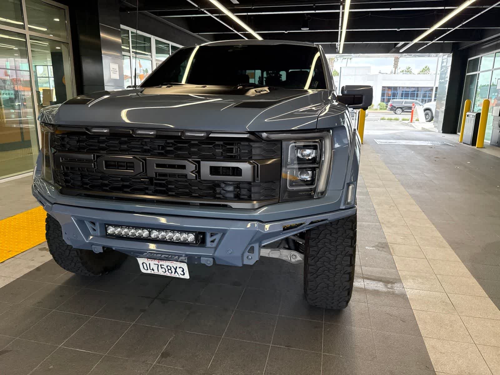 Used 2023 Azure Gray Metallic Tri-Coat Ford Raptor image 2