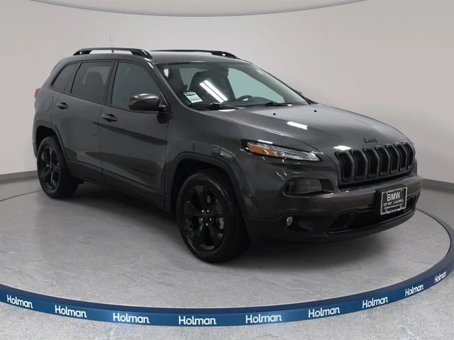 Used 2016 Granite Crystal Metallic Clearcoat Jeep Limited image 4