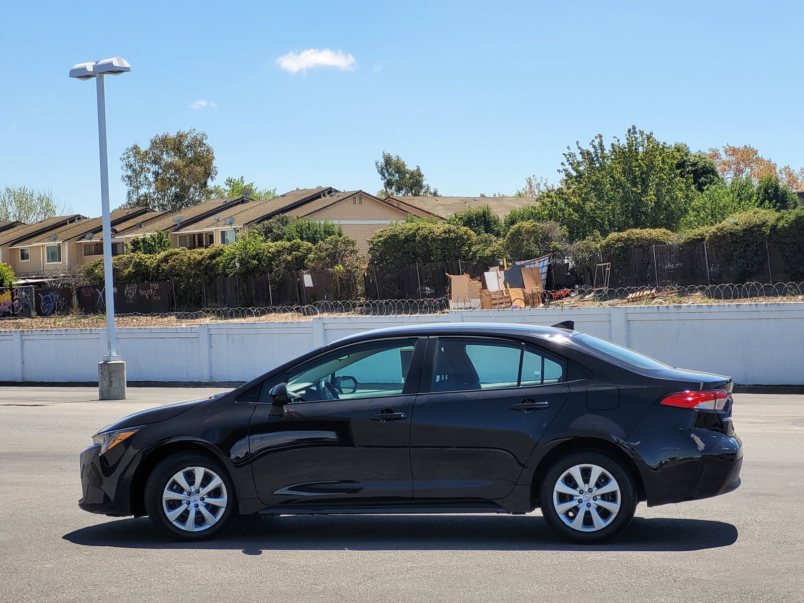 Used 2025 Black Toyota LE image 7