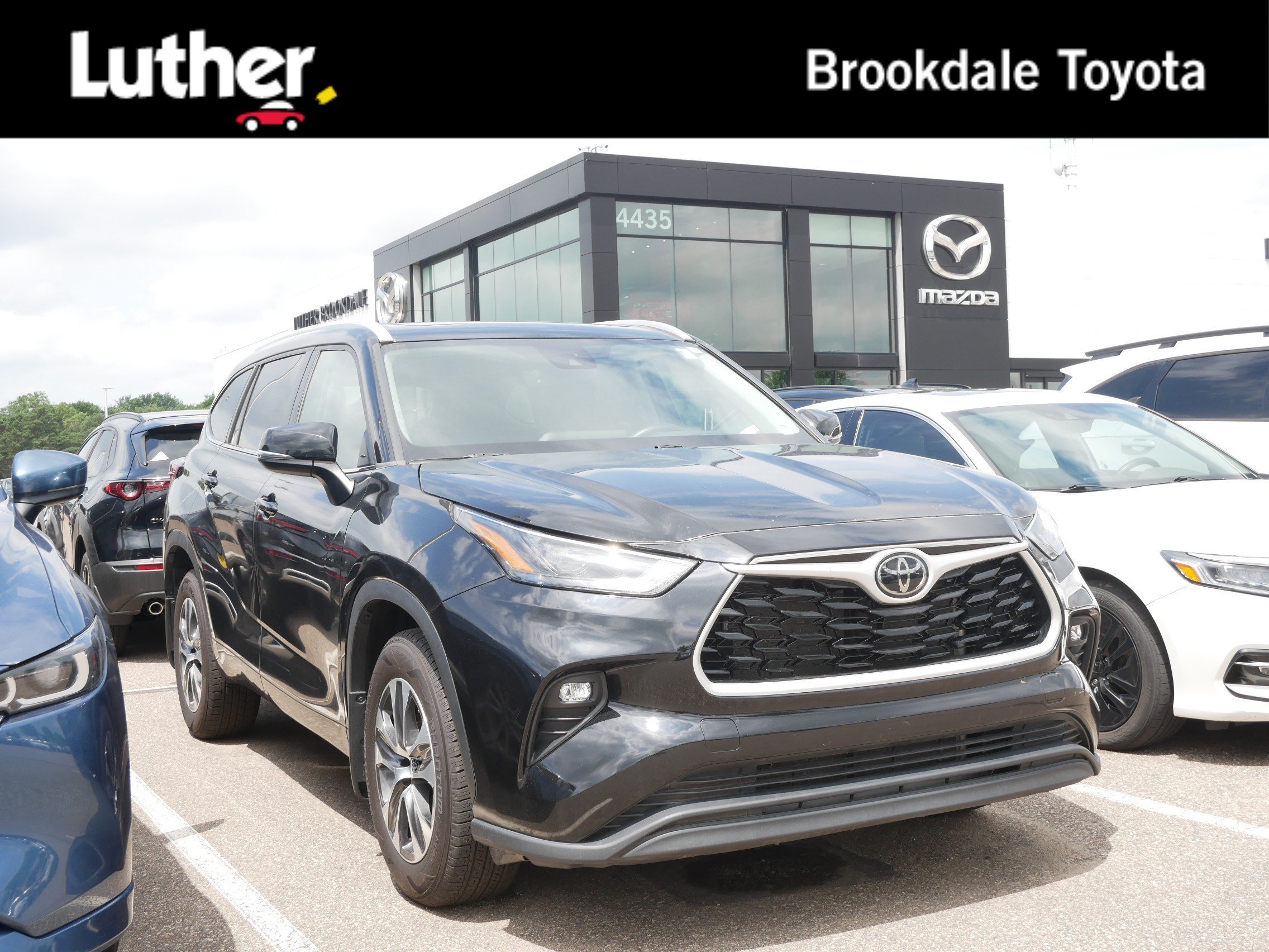 Used 2024 Midnight Black Metallic Toyota XLE image 1