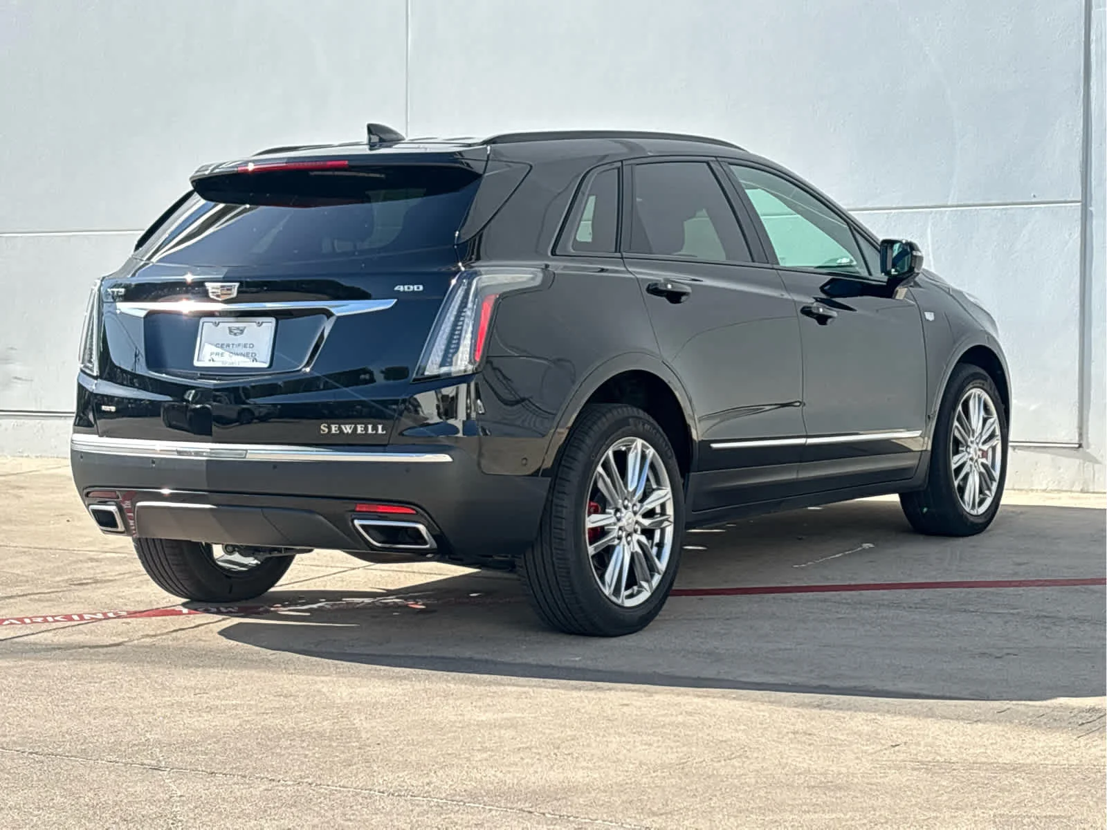 Used 2024 Stellar Black Metallic Cadillac Sport image 4
