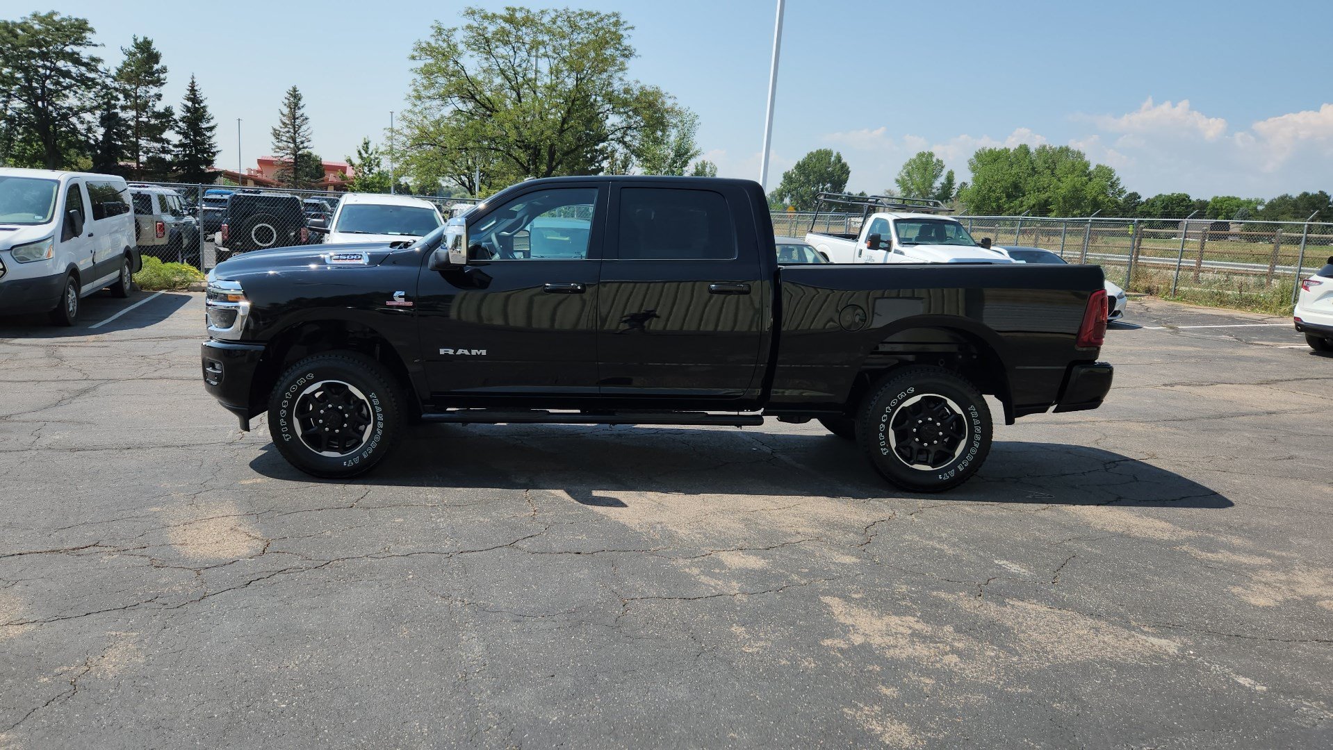 Used 2025 Diamond Black Crystal Pearlcoat Ram Laramie image 4