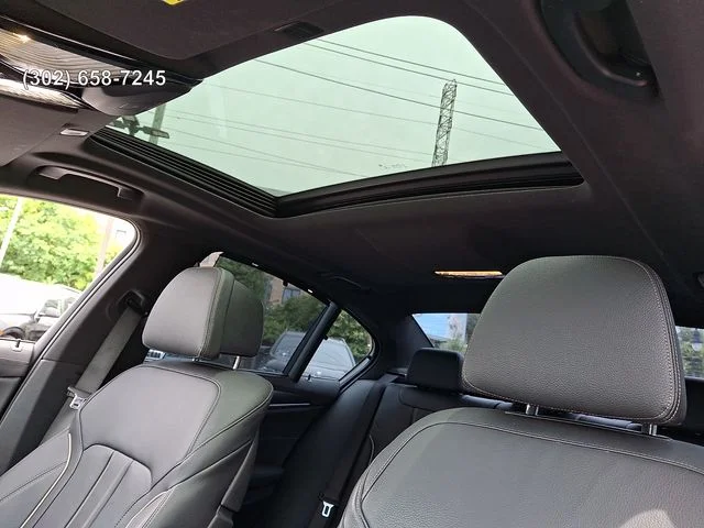 Used 2023 Skyscraper Grey Metallic BMW M550i xDrive image 13