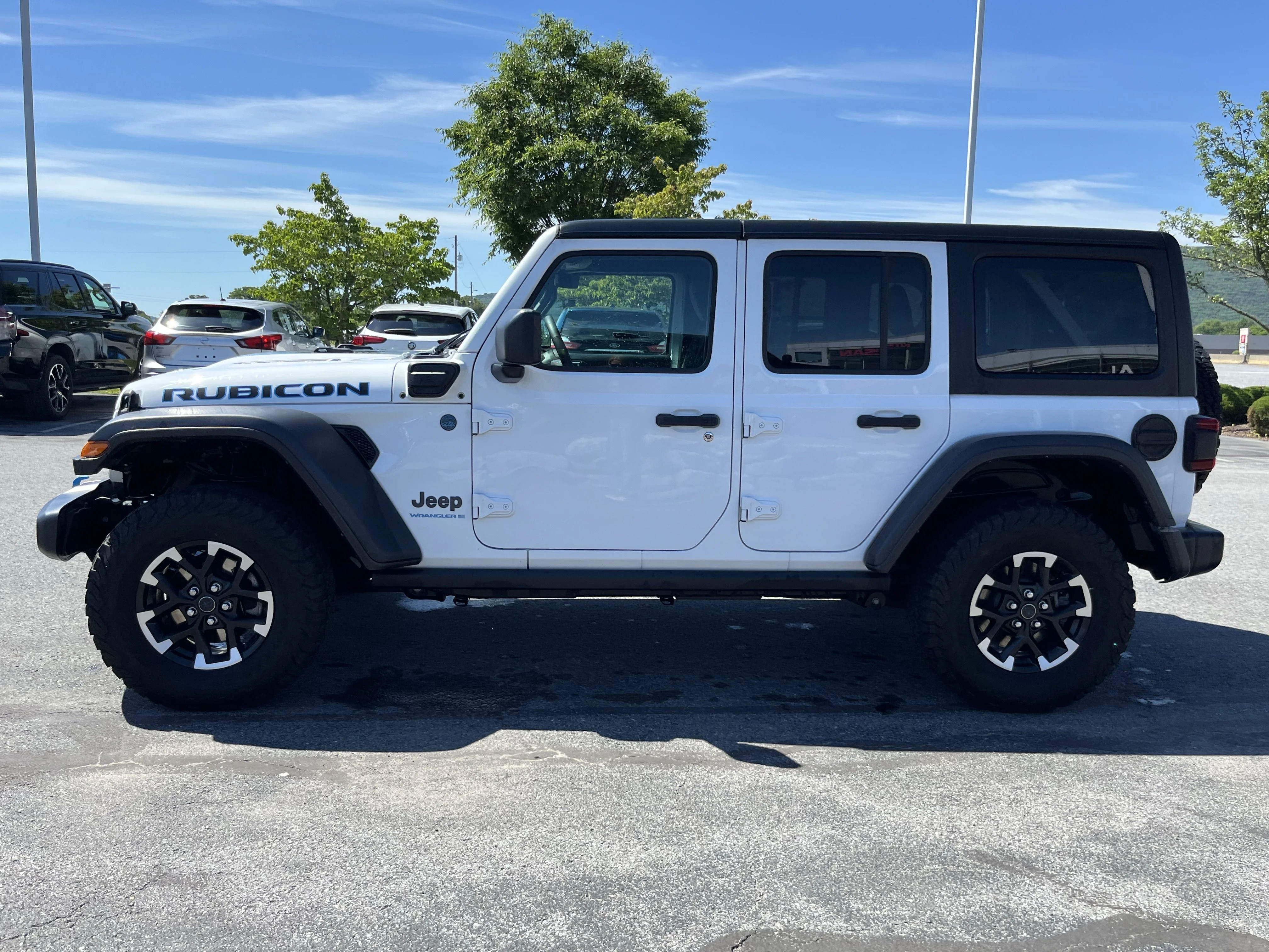 Used 2024 Bright White Clearcoat Jeep Rubicon 4xe image 8