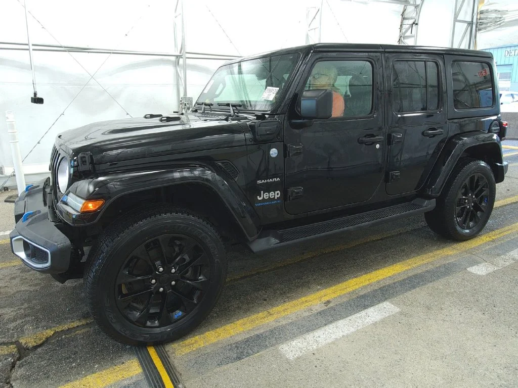 Used 2023 Black Jeep Sahara 4xe image 1