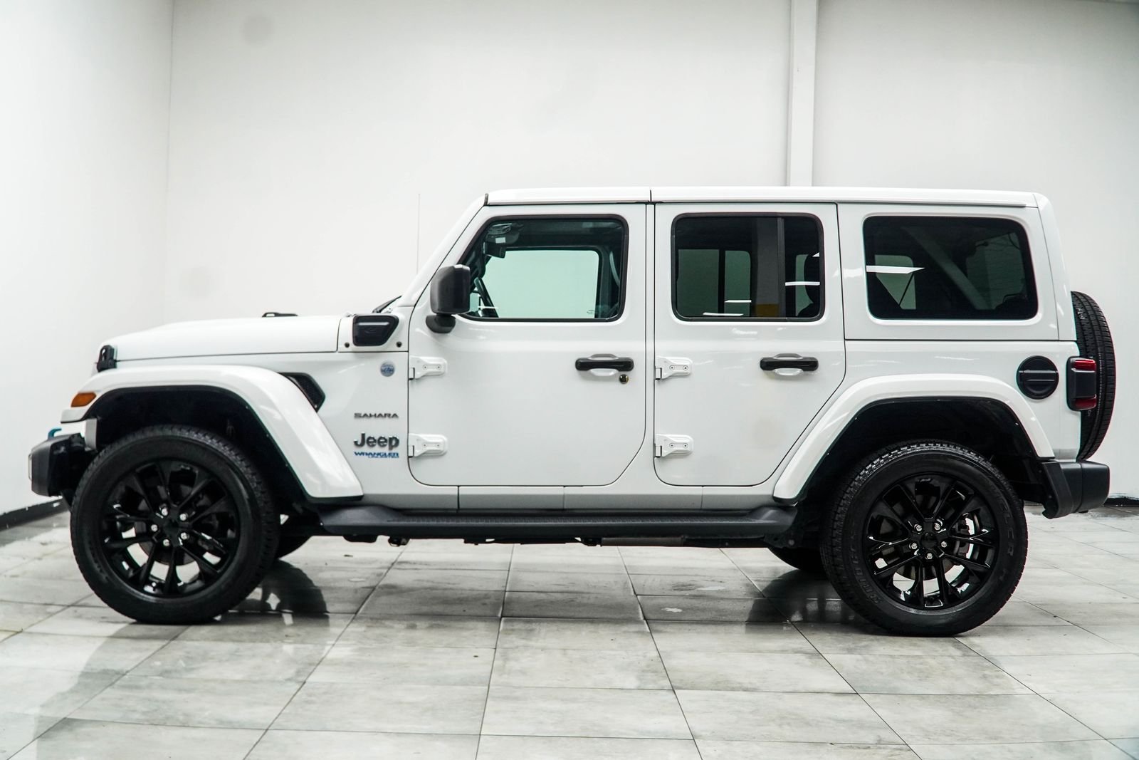 Used 2021 White Jeep Unlimited Sahara 4xe image 12