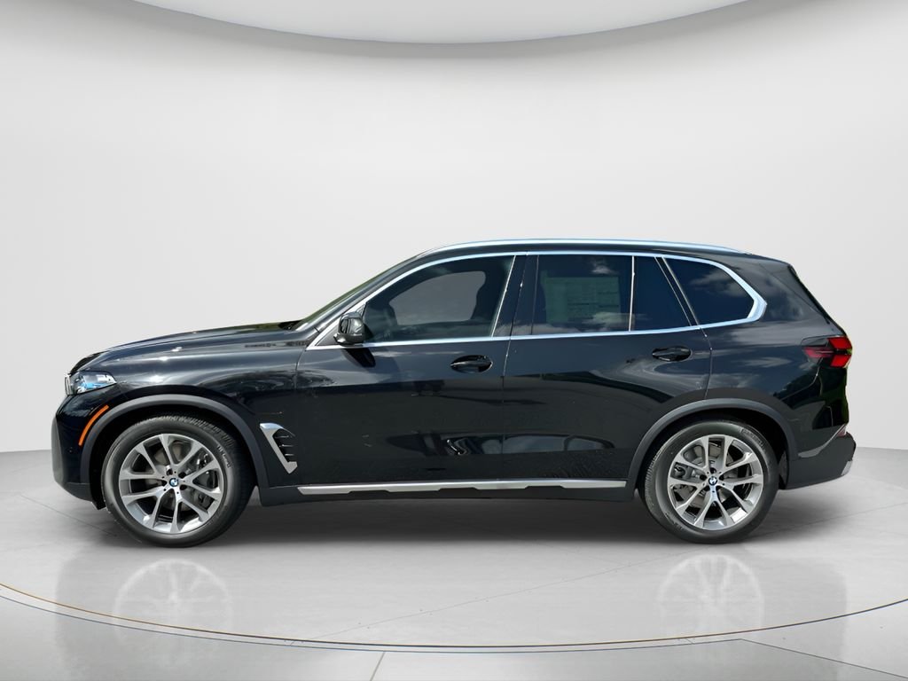New 2026 Black Sapphire Metallic BMW xDrive50e image 8
