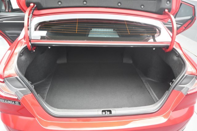 Used 2025 Supersonic Red Toyota LE image 22