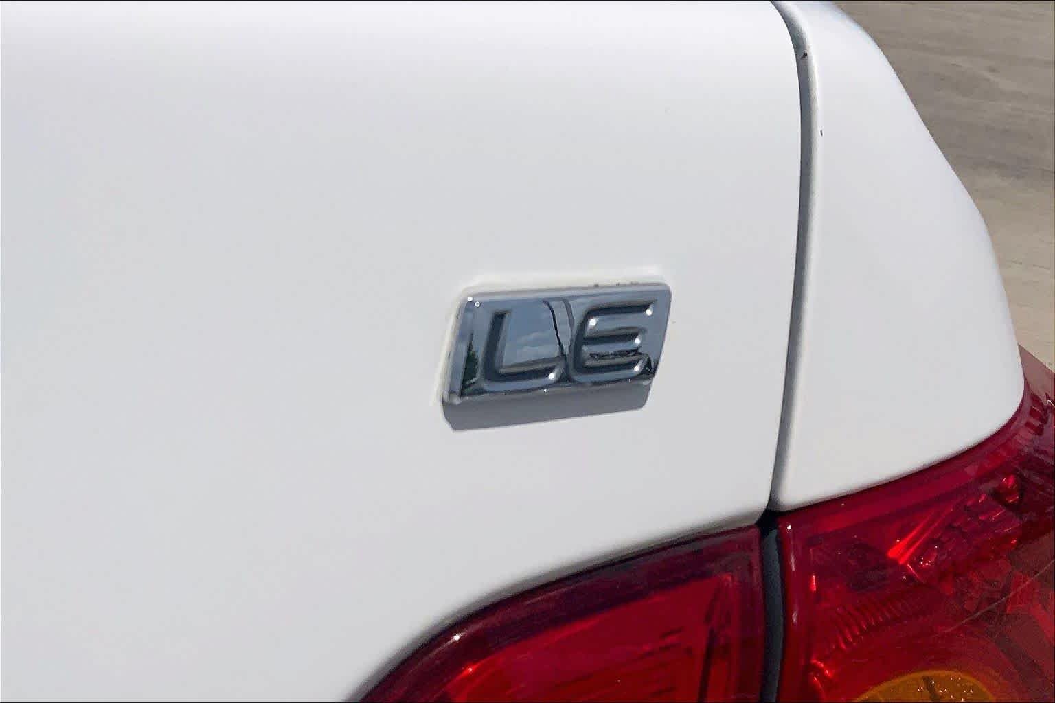 Used 2010 Super White Toyota LE image 9