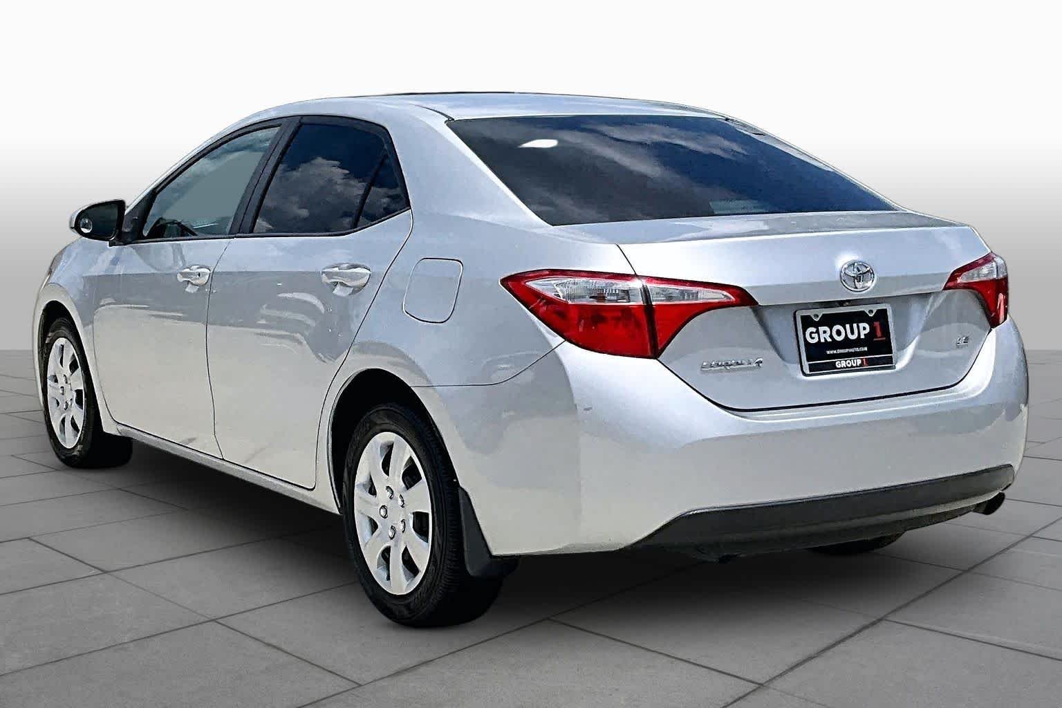 Used 2016 Classic Silver Metallic Toyota LE image 12