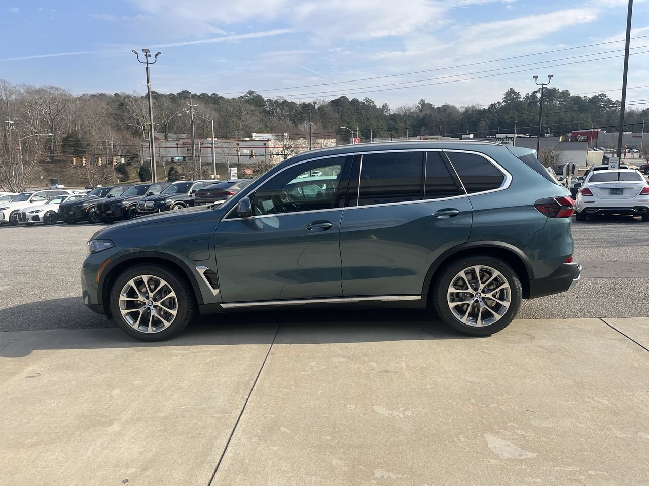 Used 2026 Blue Ridge Mountain Metallic BMW xDrive50e image 5