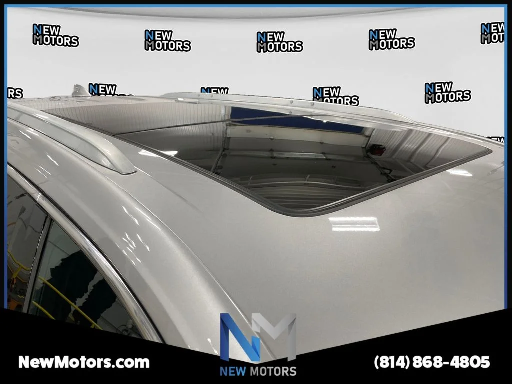 Used 2020 Radiant Silver Metallic Cadillac Premium Luxury image 16