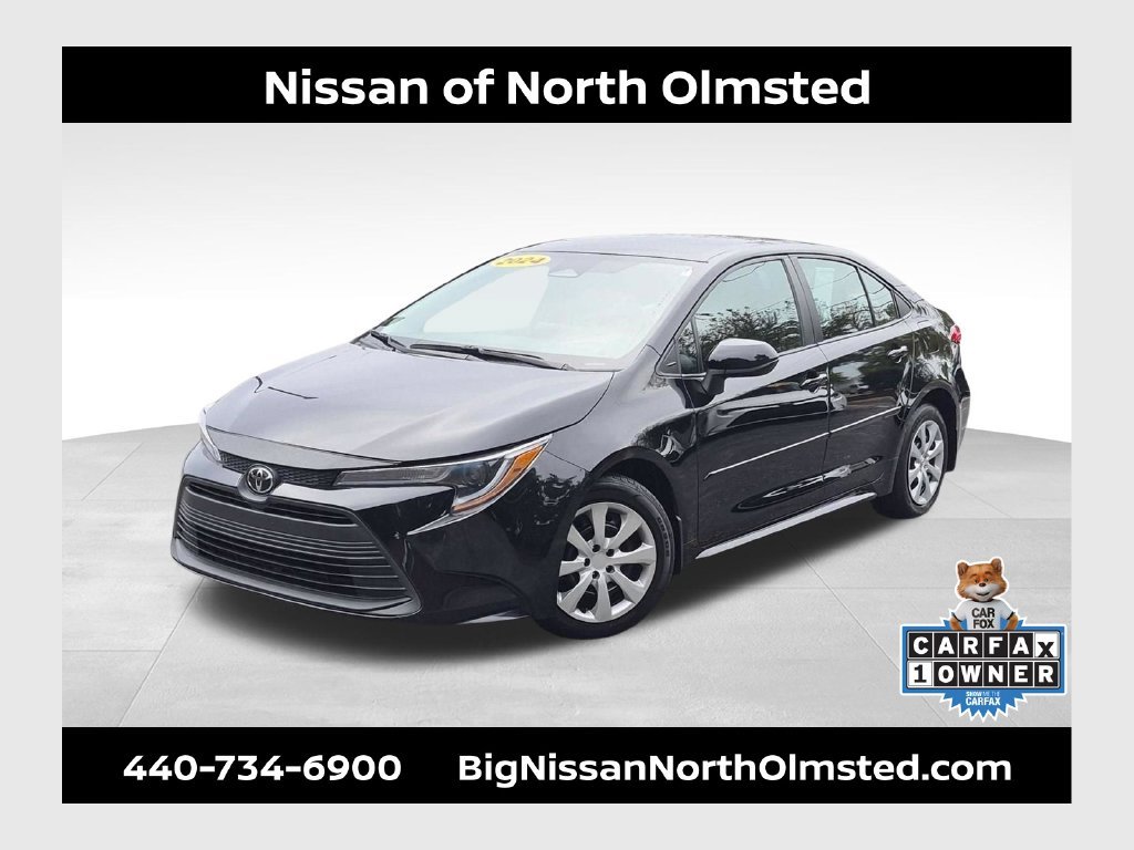 Used 2024 Midnight Black Metallic Toyota LE image 1