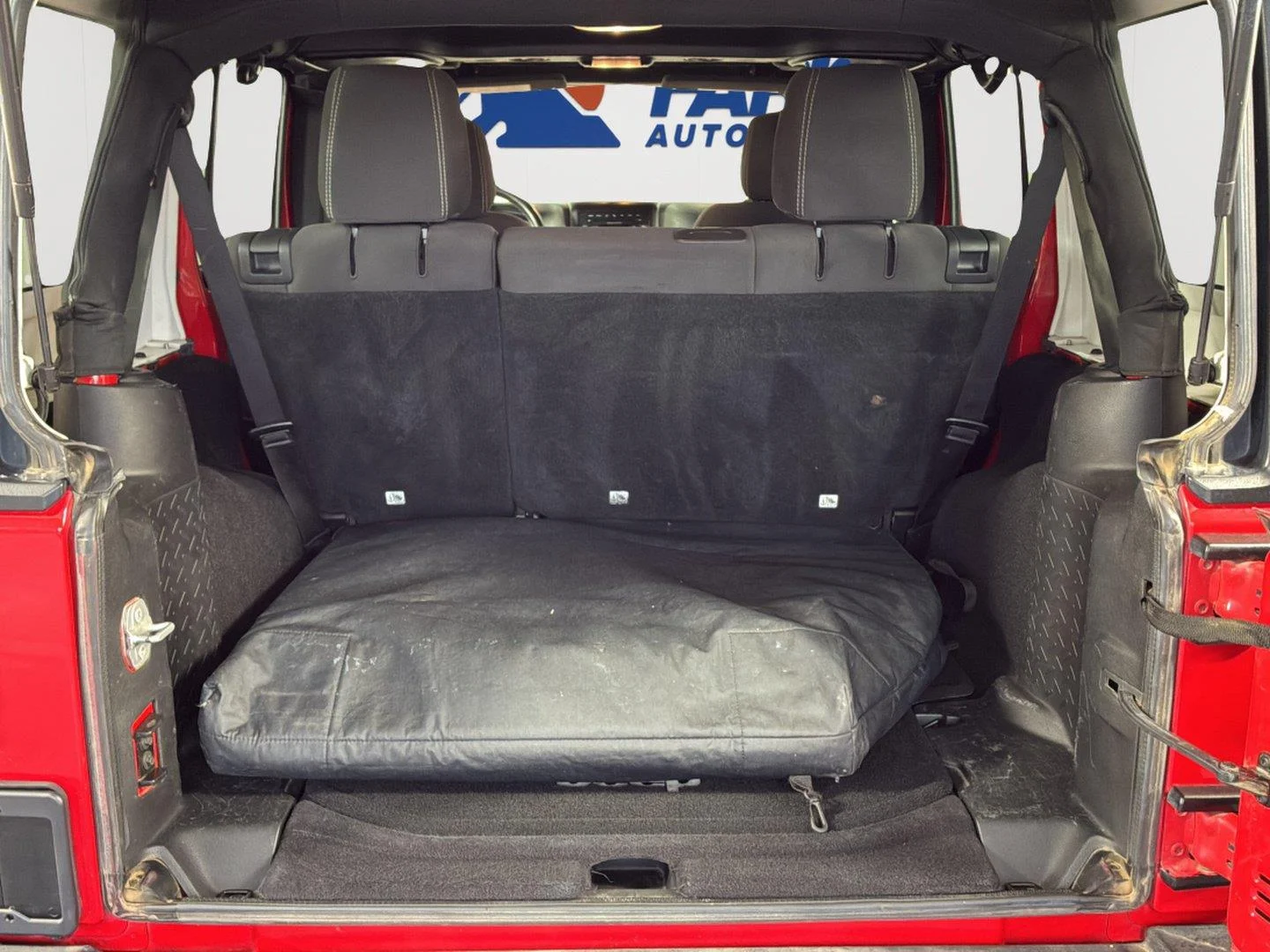 Used 2015 Firecracker Red Clear Coat Jeep Rubicon image 14