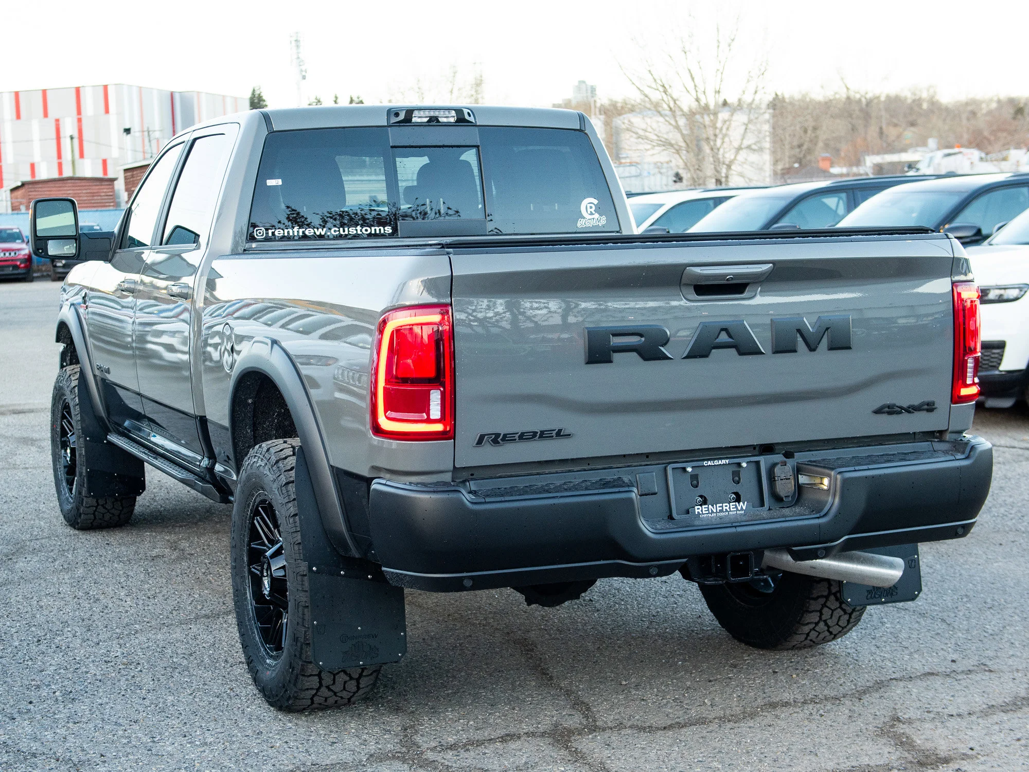 Used 2026 Grey RAM Rebel*, 2 Inch Lift, 35 Inch Tires, Winch, Trigger Industries MudFlaps image 4