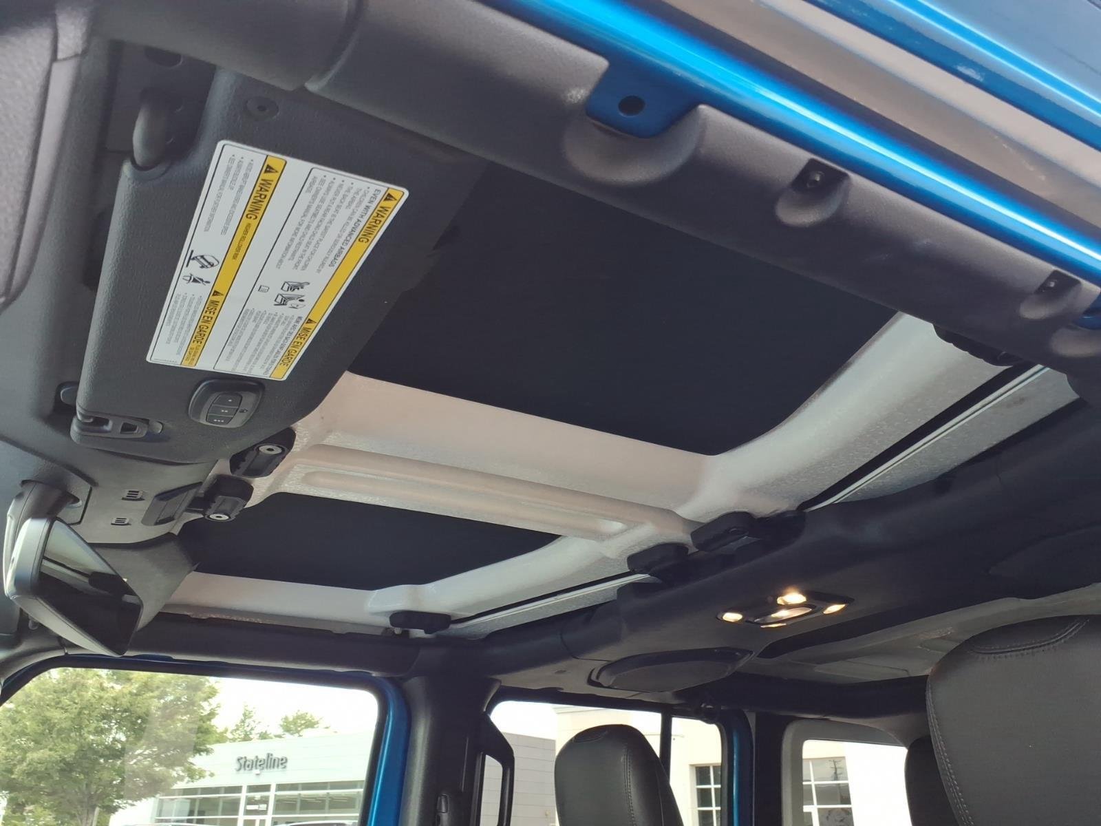 Used 2023 Hydro Blue Pearlcoat Jeep Sahara image 6