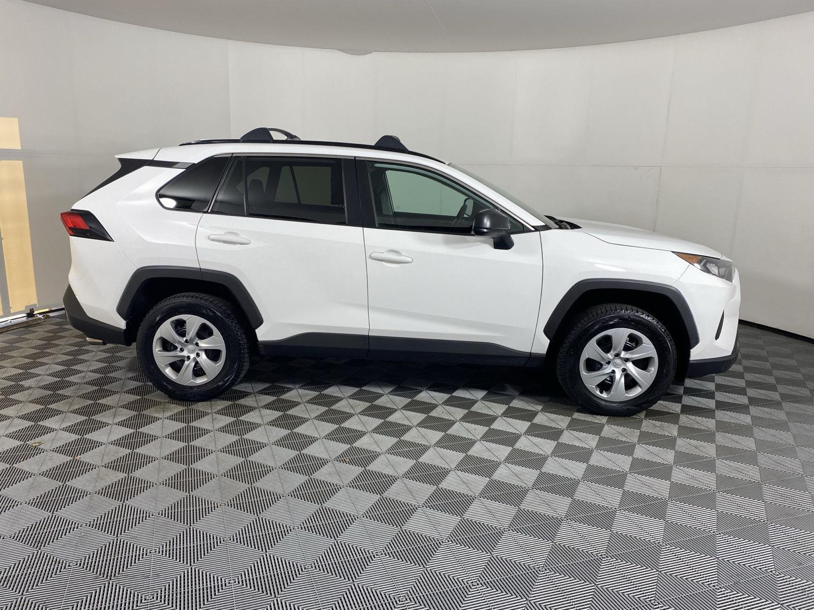 Used 2021 Super White Toyota LE image 9
