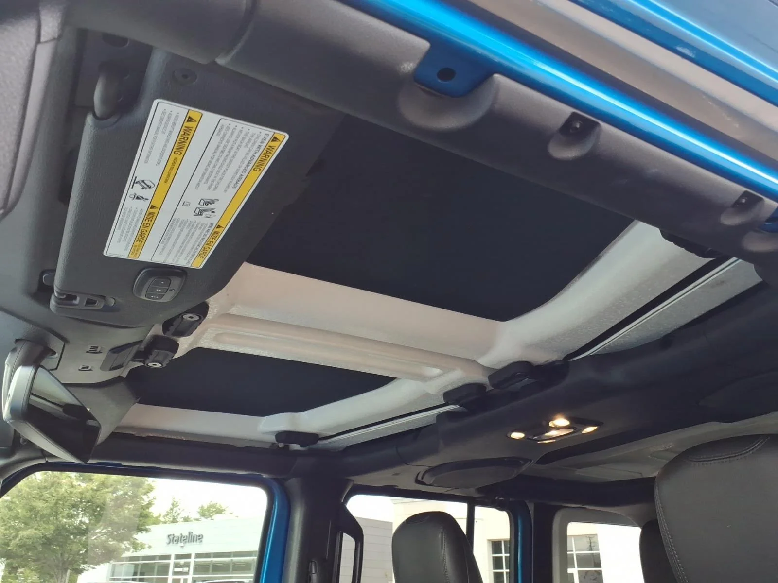 Used 2023 Hydro Blue Pearlcoat Jeep Sahara image 6