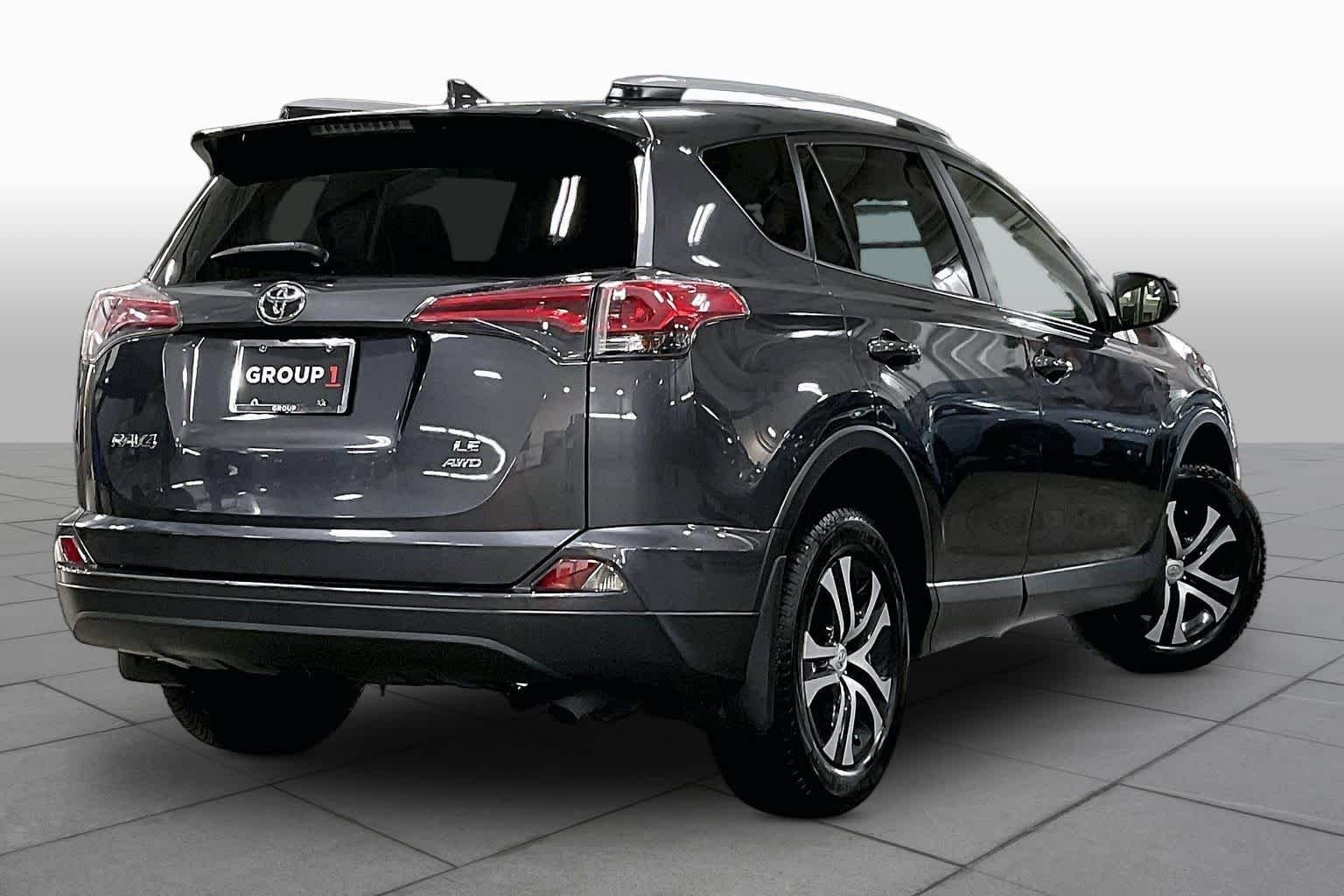 Used 2016 Magnetic Gray Metallic Toyota LE image 13