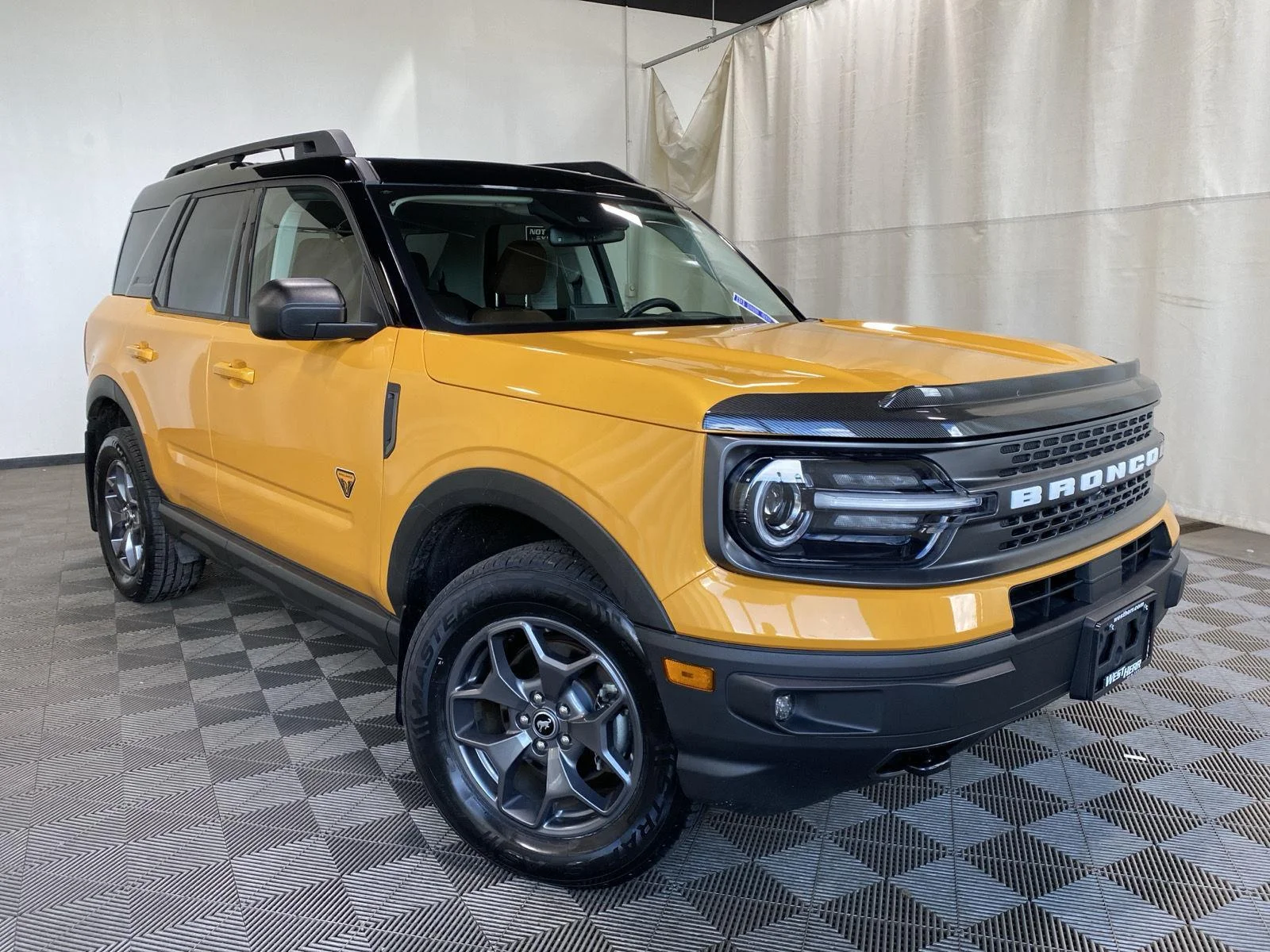 Used 2021 Cyber Orange Metallic Tri-Coat Ford Badlands image 1