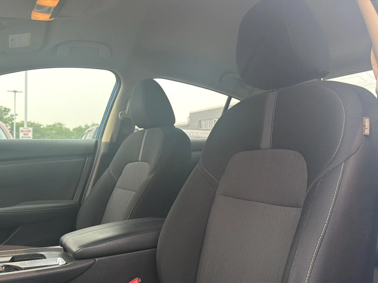 Used 2024 Electric Blue Metallic Nissan SV image 8