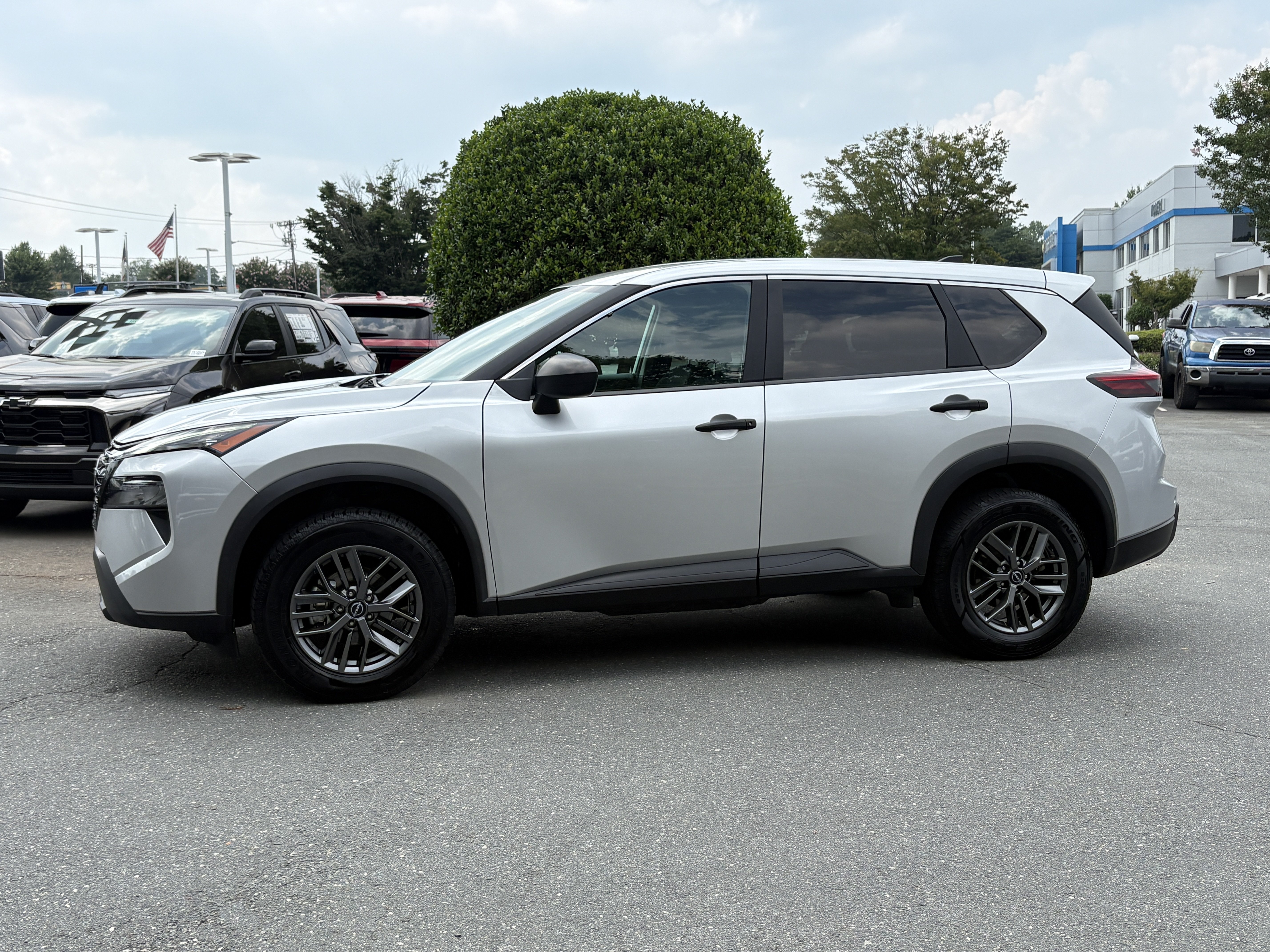 Used 2024 Brilliant Silver Metallic Nissan S image 1