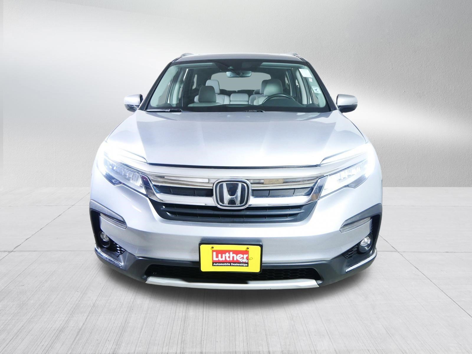 Used 2022 Honda Pilot Touring with VIN 5FNYF6H93NB002003 for sale in Brooklyn Center, Minnesota