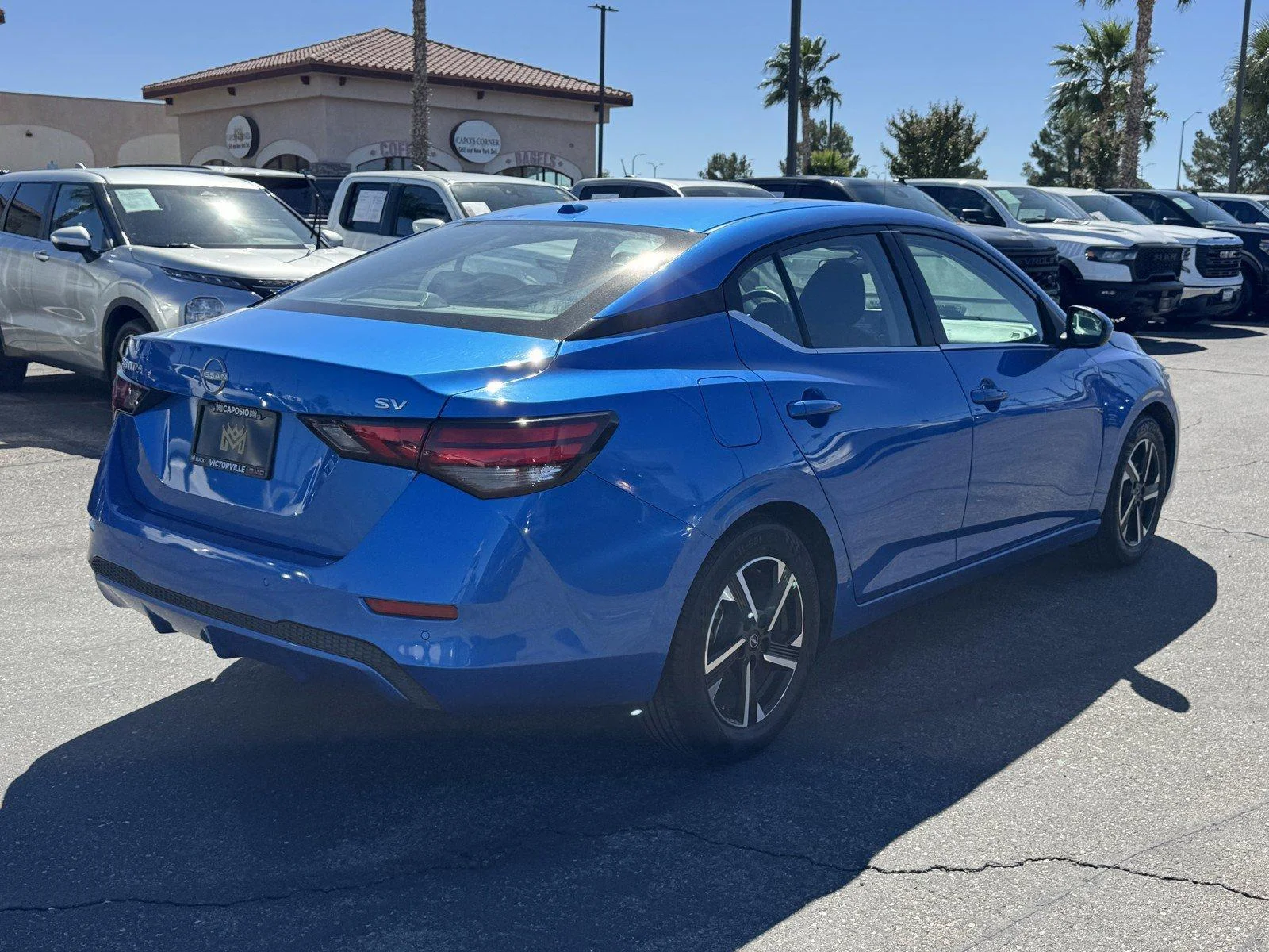 Used 2024 Electric Blue Met Nissan SV image 6