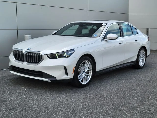 Used 2025 White Metallic BMW 530i image 1
