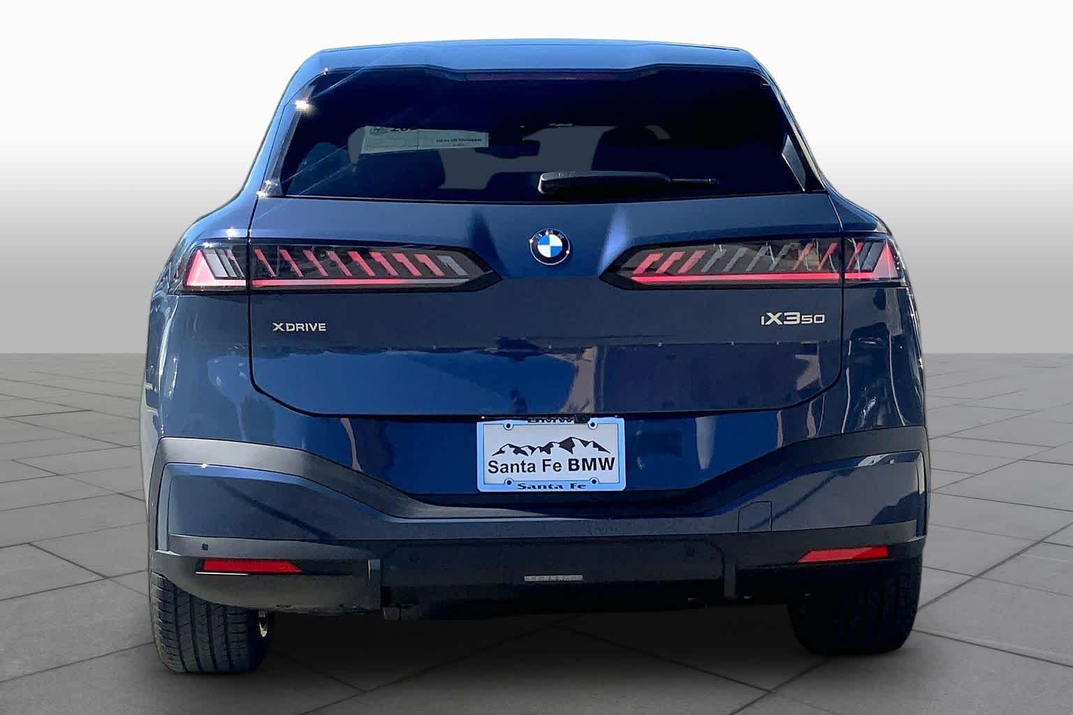 New 2027 Ocean Wave Blue Metallic BMW 50 xDrive image 4