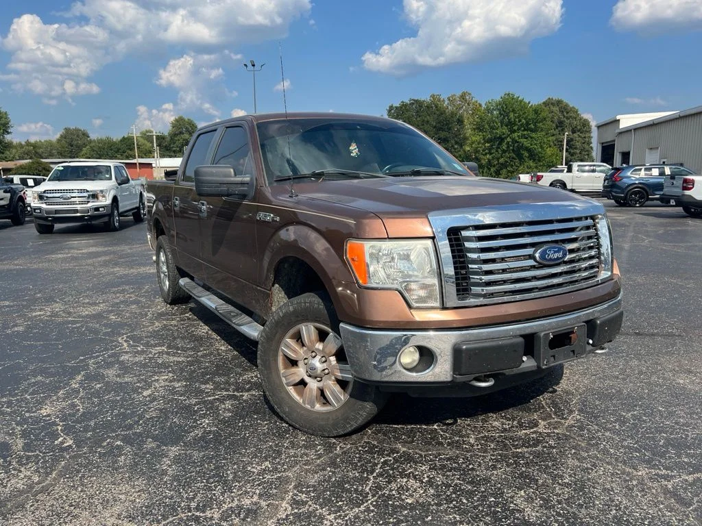 Used 2011 Bronze Metallic Ford XLT image 1