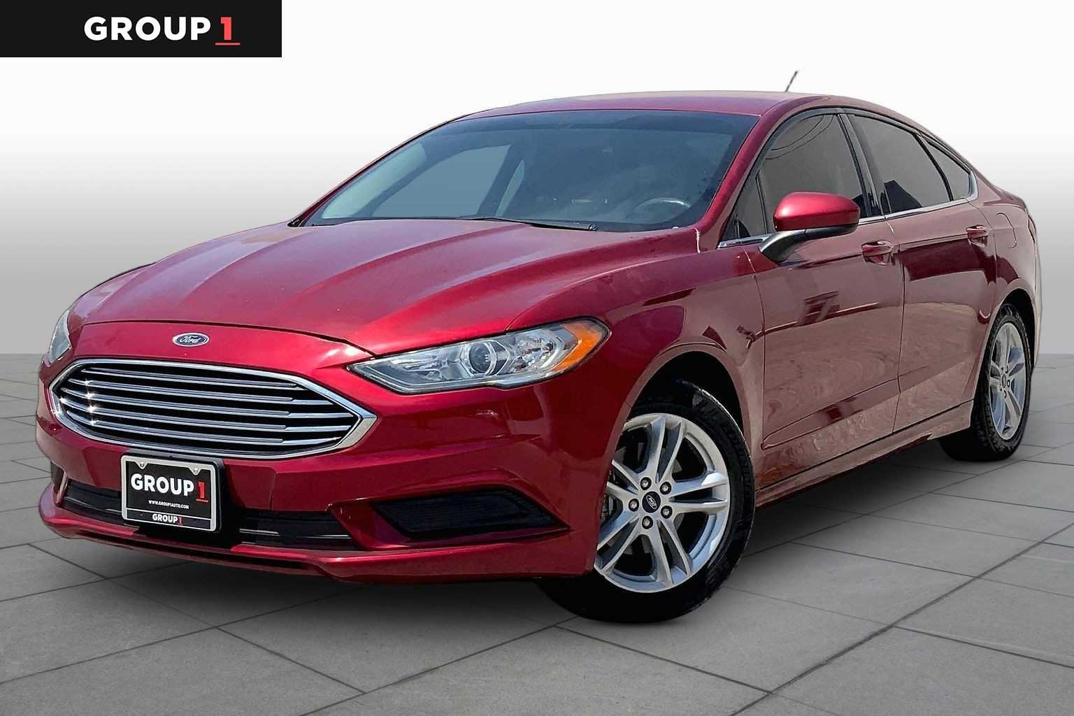 Used 2018 Ruby Red Metallic Tinted Clearcoat Ford SE image 1