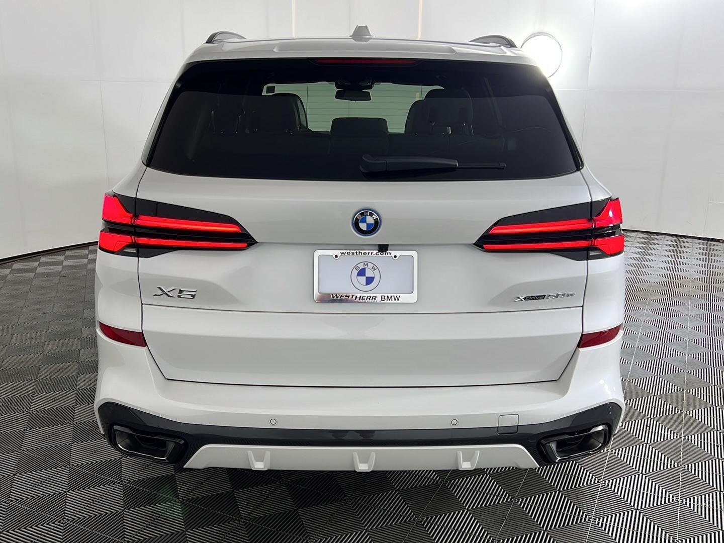 Used 2026 Mineral White Metallic BMW xDrive50e image 6