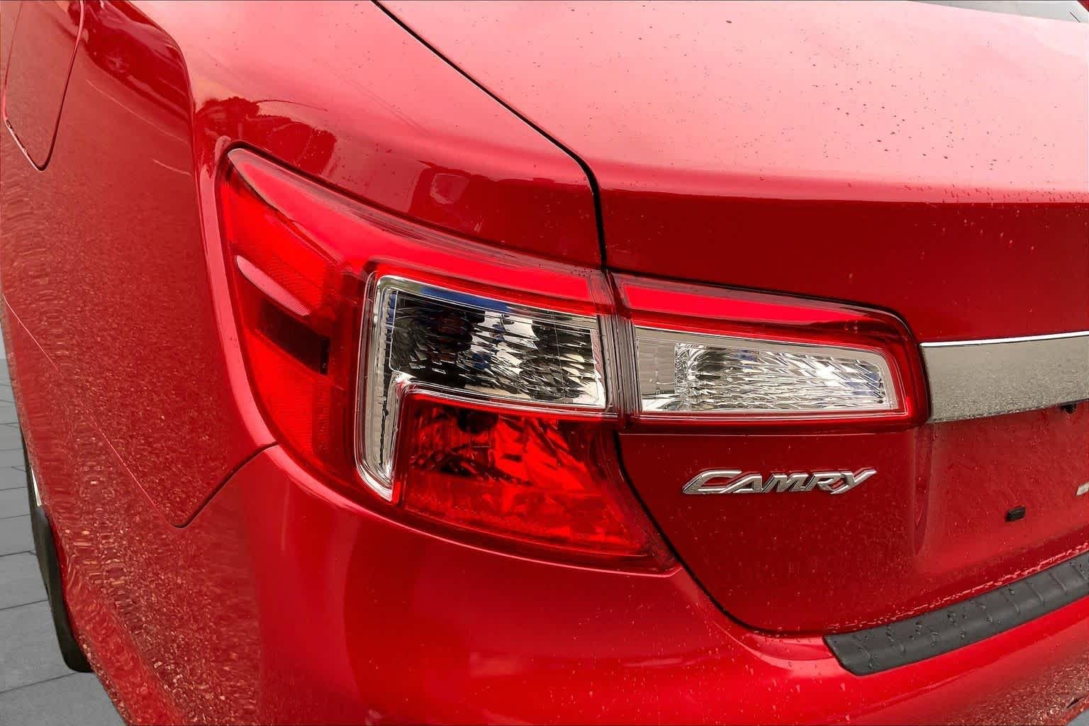 Used 2013 Barcelona Red Metallic Toyota LE image 28